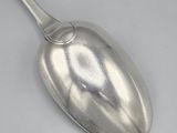 a spoon that is sitting on a table