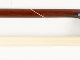 a close up of a wooden handle on a white background