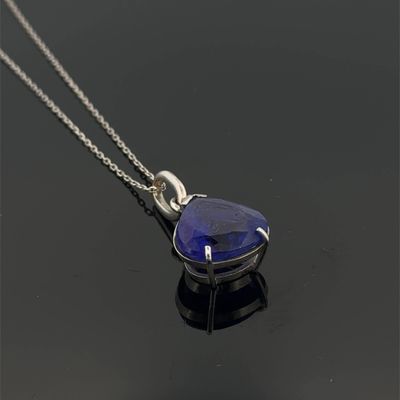 a picture of a necklace with a blue stone on it