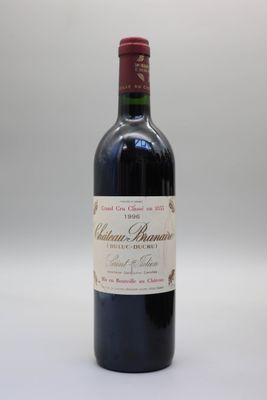 une bouteille de vin rouge portant l'étiquette du Château Brunet