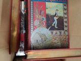 a box with a book inside of it on a table