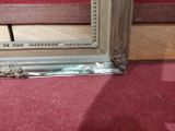 a picture of a mirror on the floor in a room