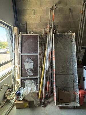 a lot of tools that are sitting on the floor
