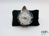 a watch that is sitting on top of a black case