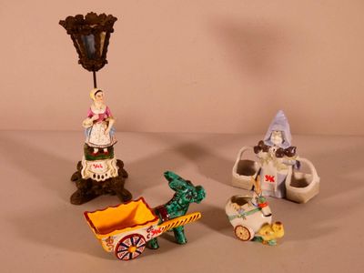 three figurines that are sitting on a table