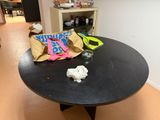 a table with a bag of chips on it and a bag of chips on the table