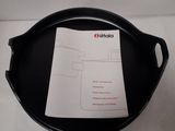 a black tray with a piece of paper on top of it