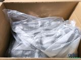 a cardboard box filled with a lot of plastic material