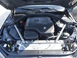 a bmw engine in the trunk of a car