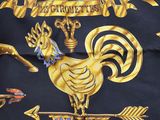an image of a black and gold scarf with a rooster on it