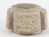 an image of a stone bowl on a white surface