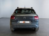 a small car that is parked in a room