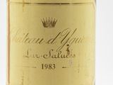 a close up of a bottle of wine with a crown on the label