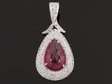 a pear shaped ruby and diamond pendant