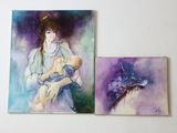 painting of a woman holding a baby and a painting of a woman holding a baby