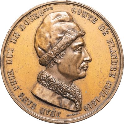 une image représentant une médaille d'or sur laquelle figure le portrait d'un homme portant un turban