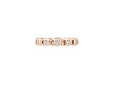 une bague en or rose sertie de trois diamants