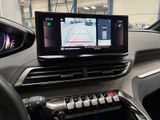 the dashboard of a car with a gps device in the center