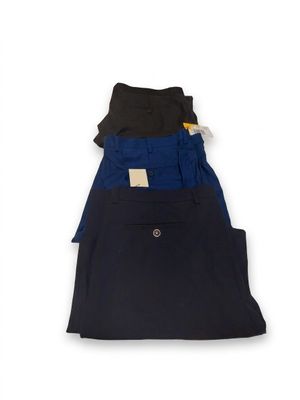 three pairs of men ' s pants stacked on top of each other