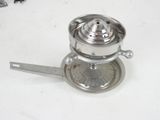 a silver coffee grinder sitting on a white table