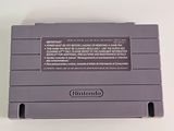 an old nintendo game console sitting on top of a white table