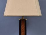 a lamp that is sitting on top of a table next to a lamp