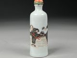 chinese white glass snuff bottle decorated with a scene of a boy and a dog