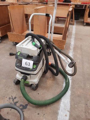 a vacuum that is sitting in the middle of a room