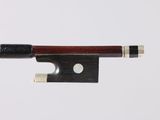 violin bow made of wood and metal on a white background