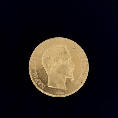 l'image d'une pièce d'or sur laquelle figure une tête de femme