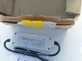 an open box with a yellow light on top of it