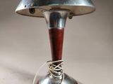 a lamp that is on a table with a cord