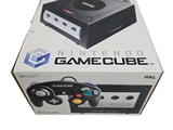 a box with a gamecube inside of it on a white surface
