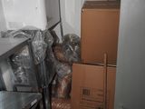 a stack of boxes in the corner of a room