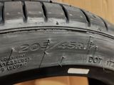 a close up of a tire on a cardboard box