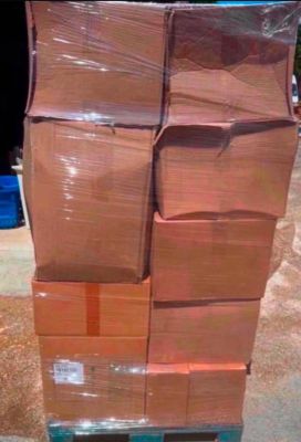 a large stack of boxes sitting on a pallet