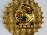 an image of a close up of a badge on a white surface