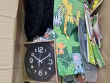 a cardboard box with a clock inside of it