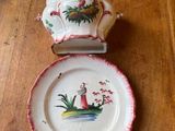 a small plate and a small bowl on a wooden table