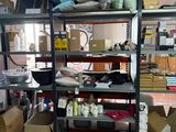 a room filled with lots of boxes and shelves
