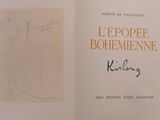 an open book with a drawing of a woman on it