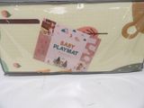 a baby play mat with a teddy bear on it