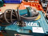 a blue box with a bunch of wires on top of it