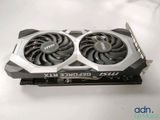 a close up of a video card with two fans on top of it