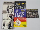 un grand nombre de livres posés sur une table