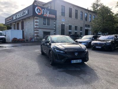 a car parked in front of a building in a parking lot
