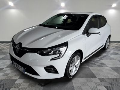 the white car is parked on a checkered floor in the garage