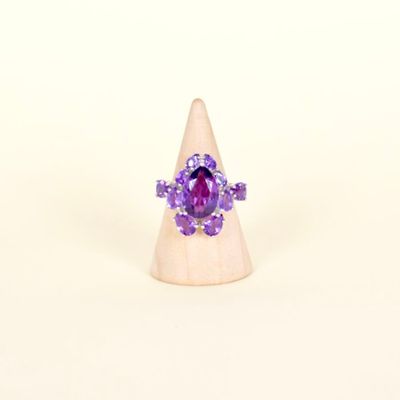 Bague stylisant une orchidée en argent (925/oo), centrée d'u…