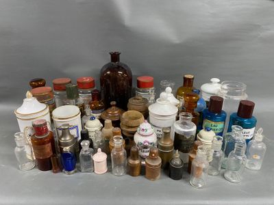a lot of bottles that are sitting on a table