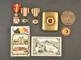 many medals and cards on the table